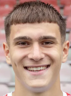 E. Kujović